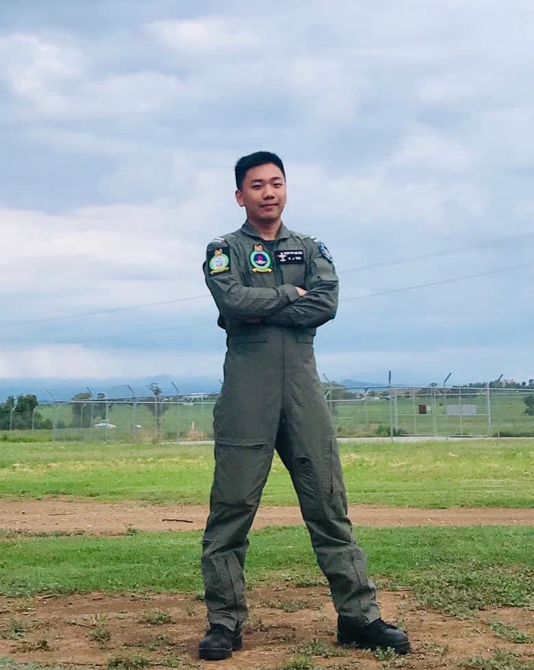 Remus Teo in an RSAF flight suit during his training period